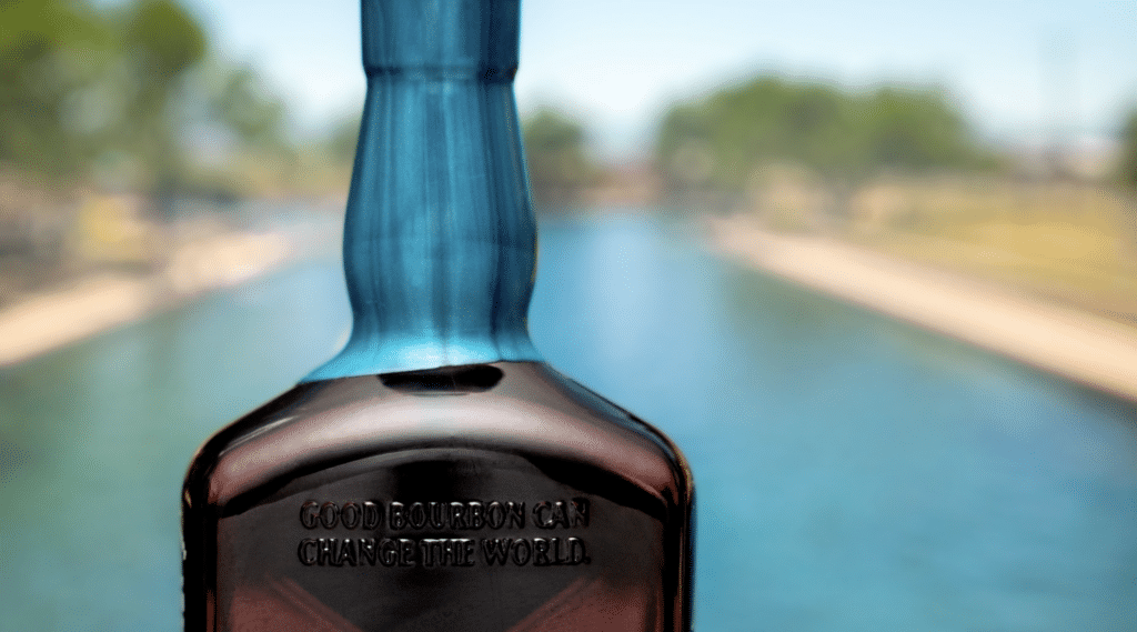 Good Bourbon Can Change The World on the back of a Garrison Brothers Bourbon Balmorhea bottle