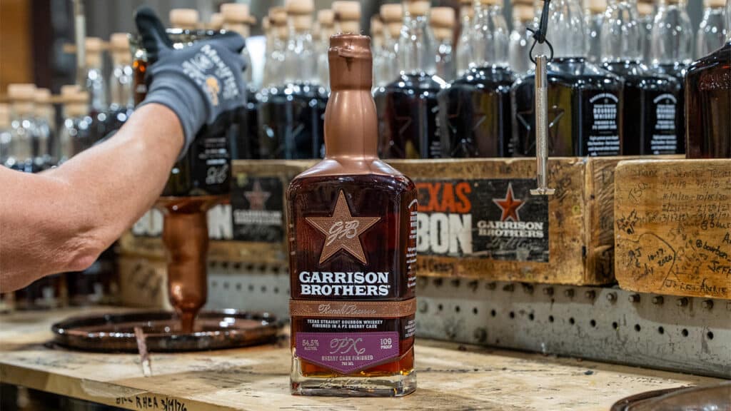 Bottling and wax dipping Garrison Brothers PX Sherry Cask Finish Bourbon