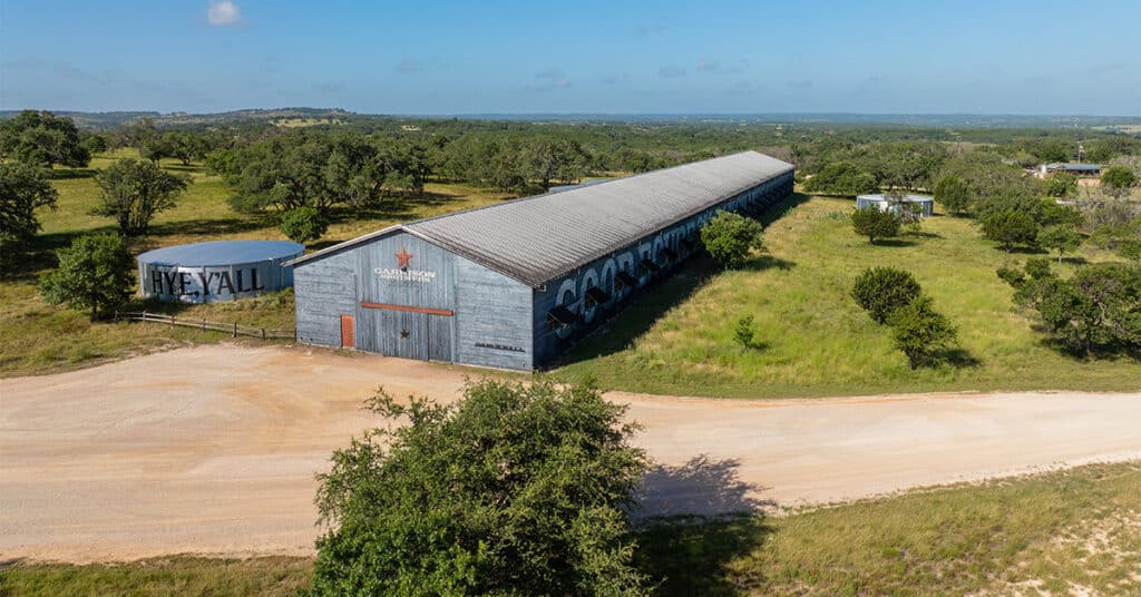 Aerial image of barrel barn in Hye, Texas